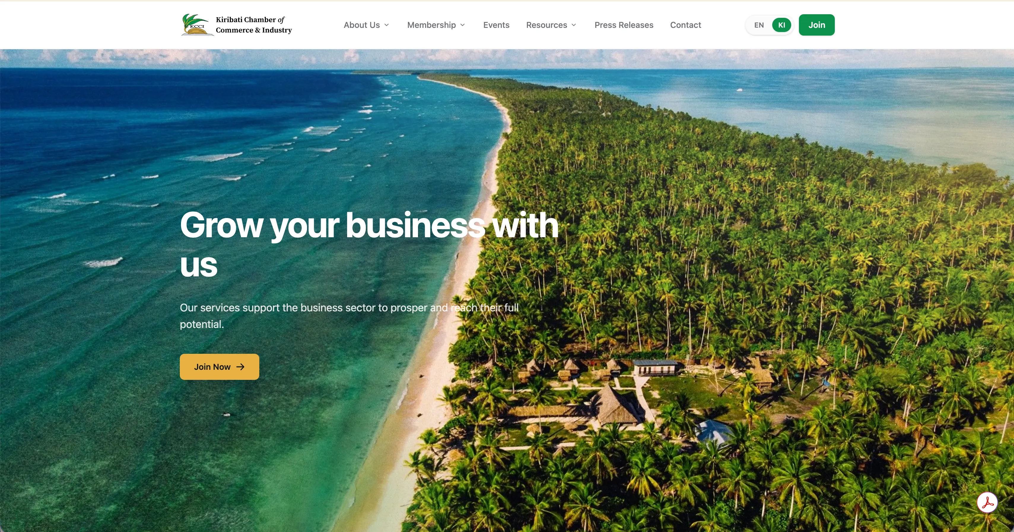 The KCCI home page, with the English and Kiribati language switch and a 'Grow your business with us' headline over an aerial photograph of the Tarawa shoreline